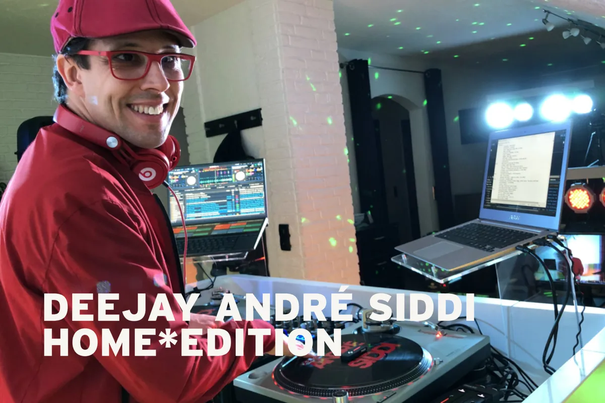 DJ Andre Siddi bei einem Live-Auftritt auf einer professionellen Bühne.